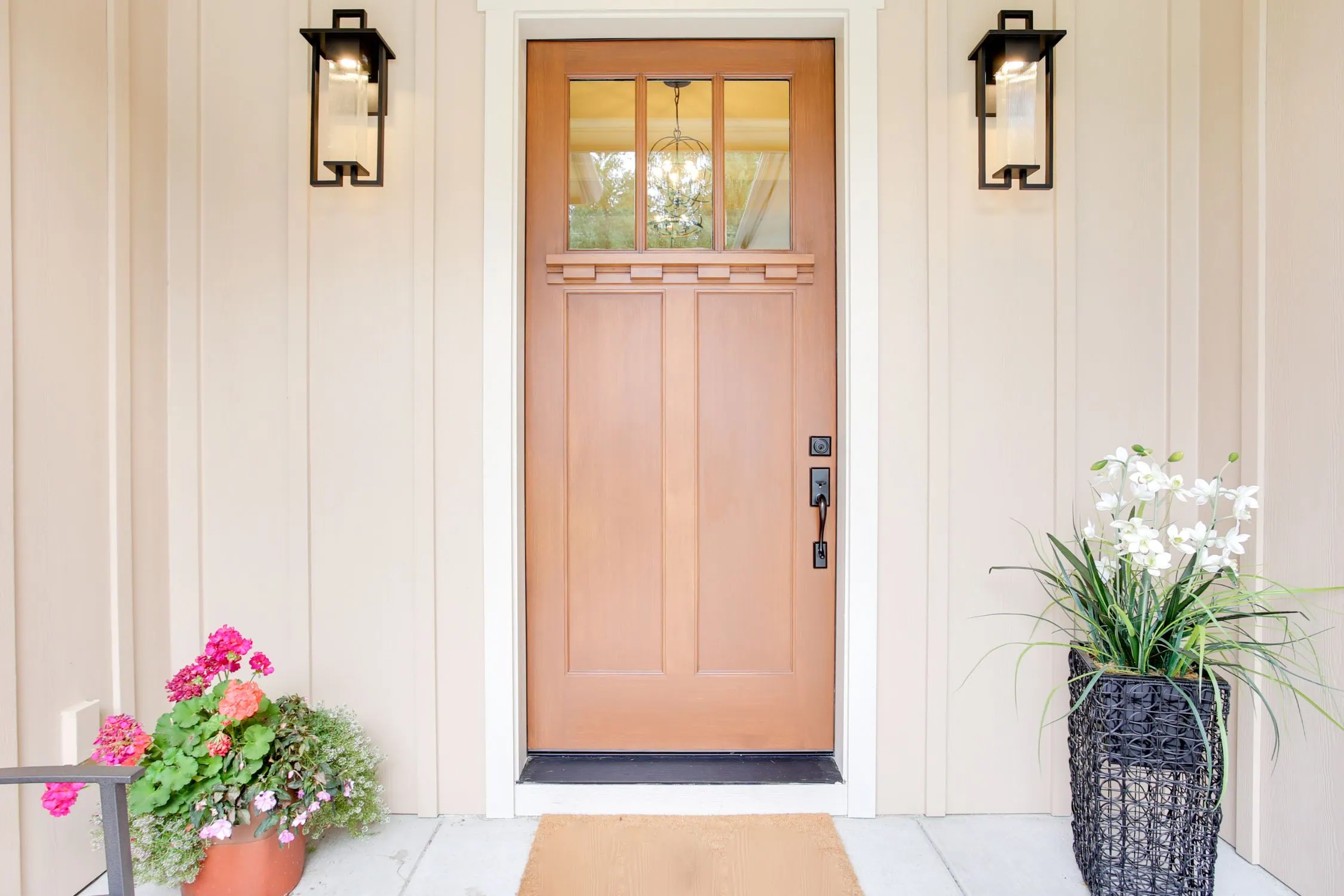 double door vs single door - house with Craftsman style brown door