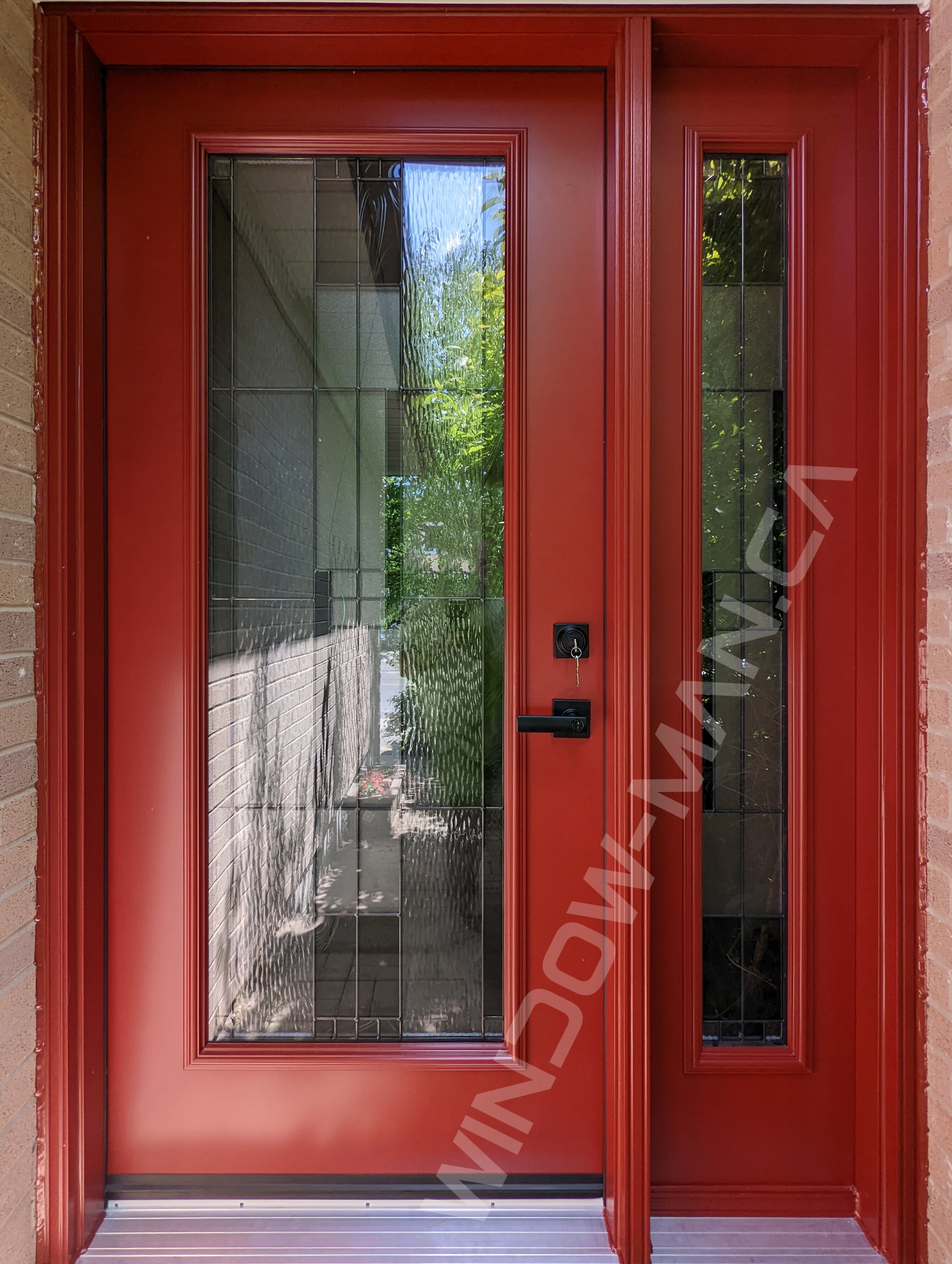 aztec red steel door with sidelight and full santa fe stained glass