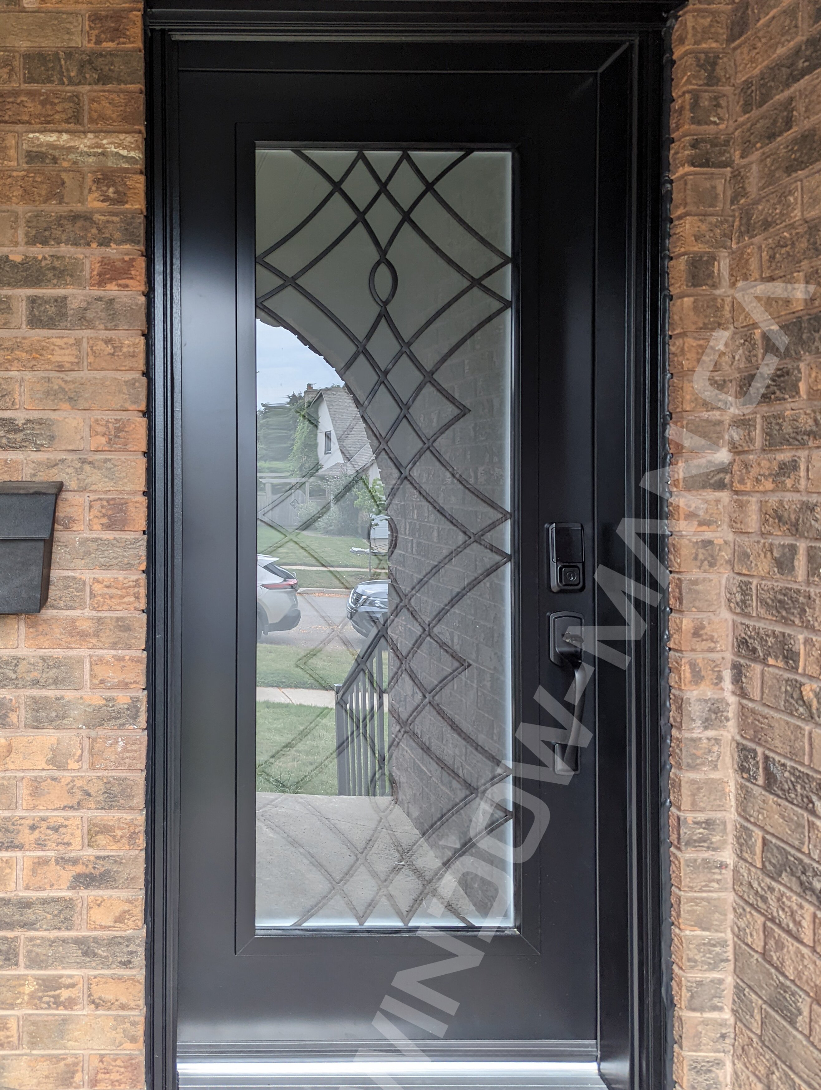 black steel door with full oak ridge wrought iron glass, smart lock