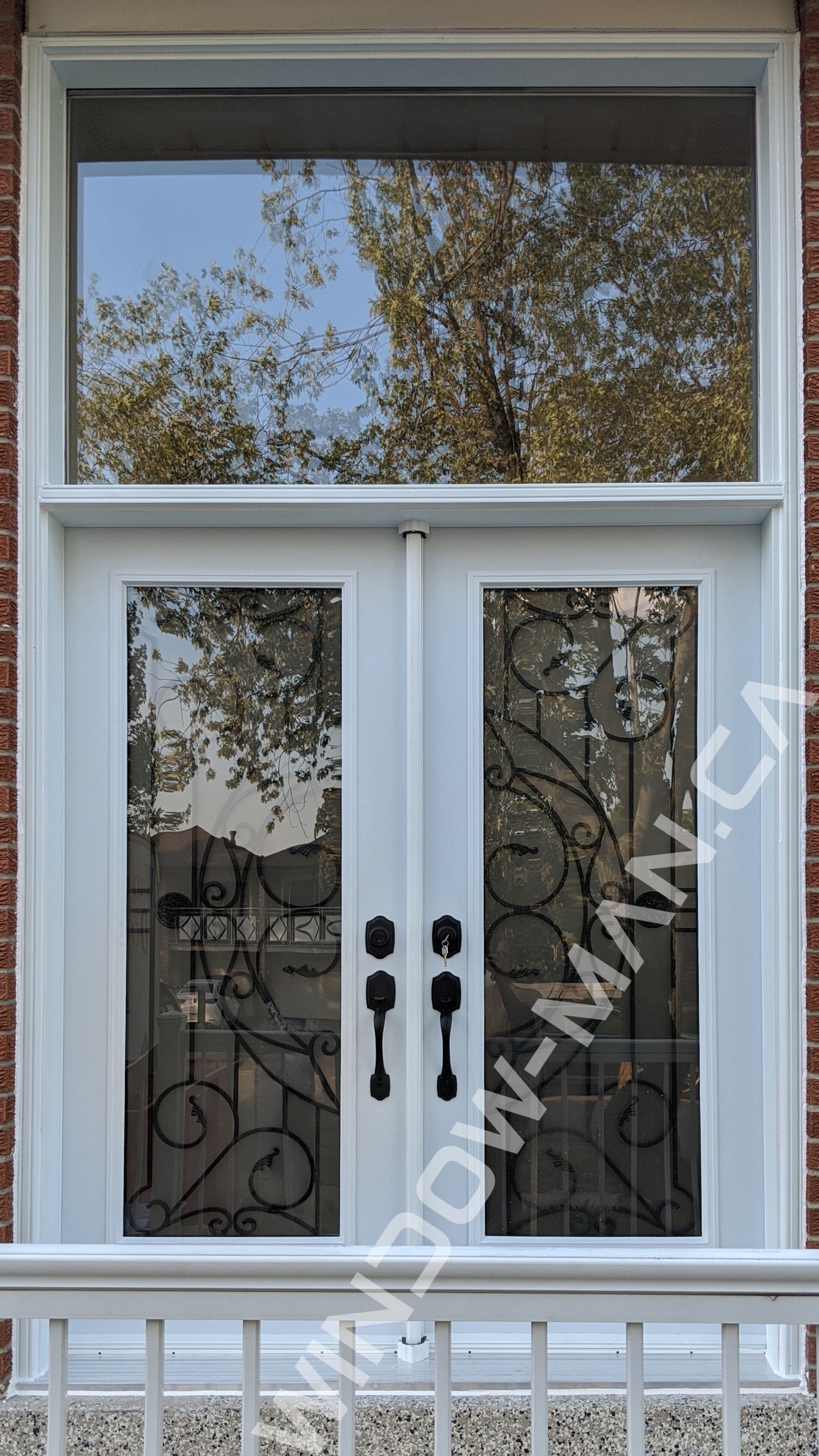 door exterior steel double in white with rochester full wrought iron glass with huge transom