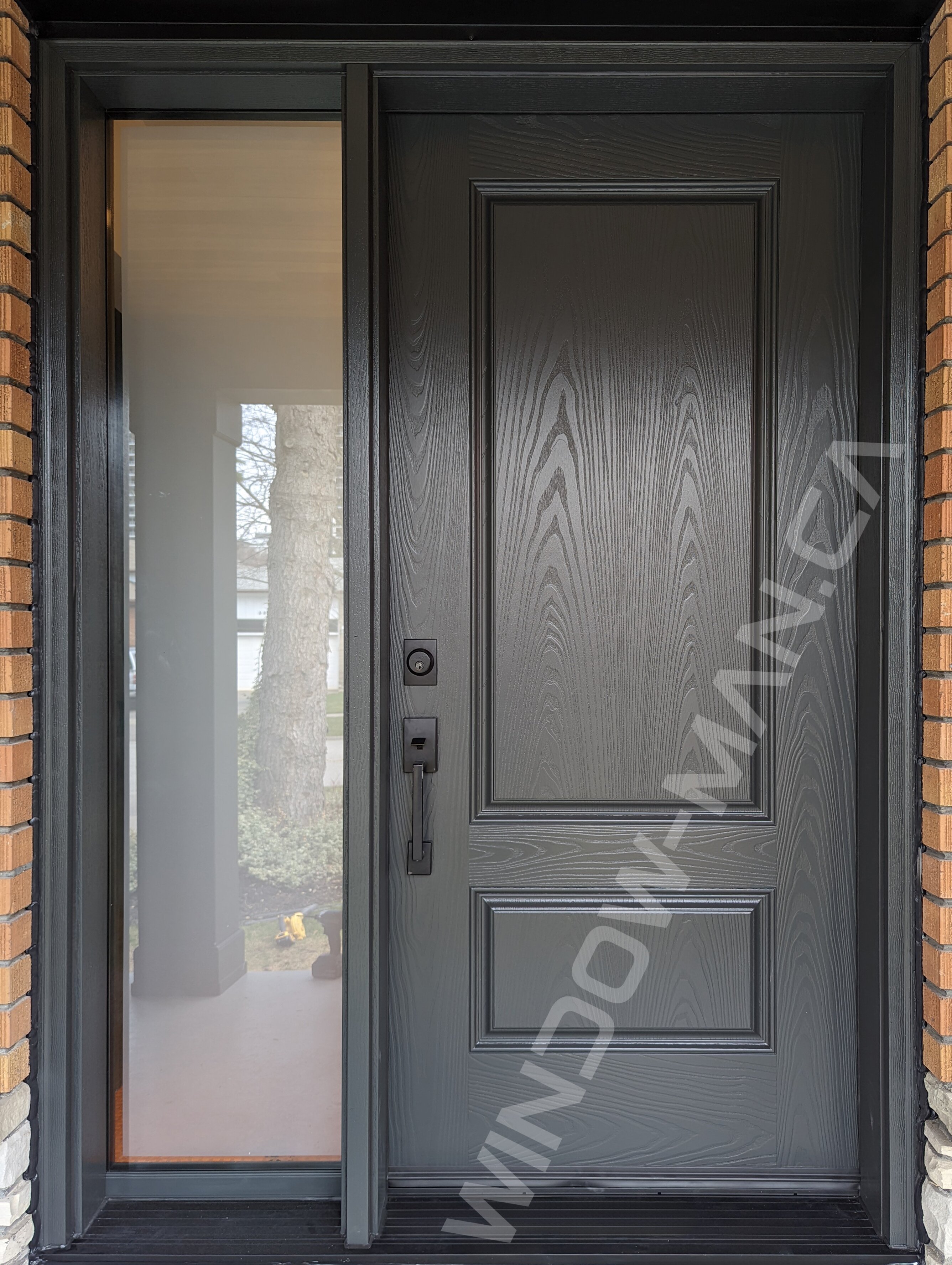 iron ore fiberglass door with sidelight and clear border glass, wide sidelight