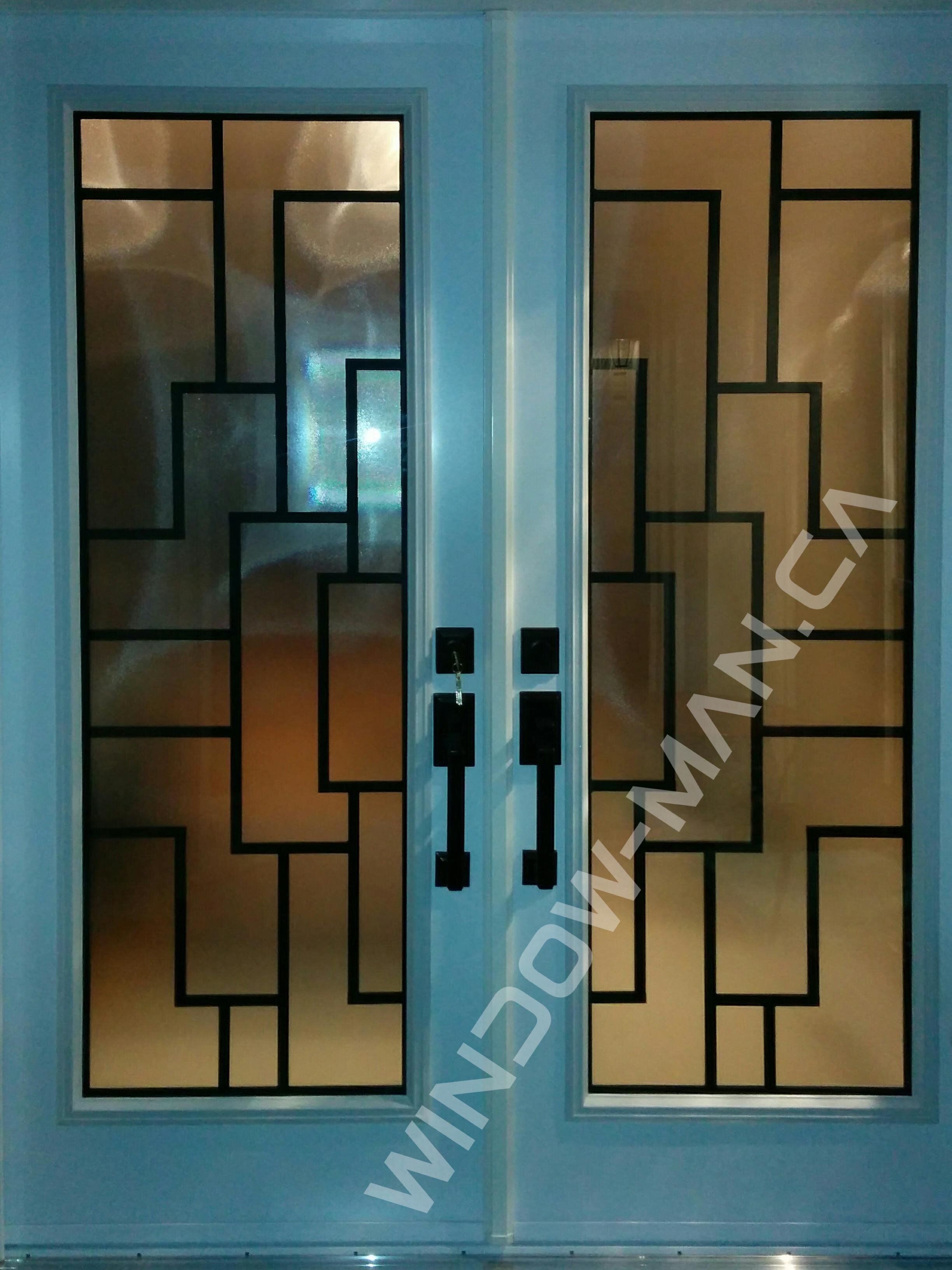 outside double doors in white with malibu full wrought iron glass