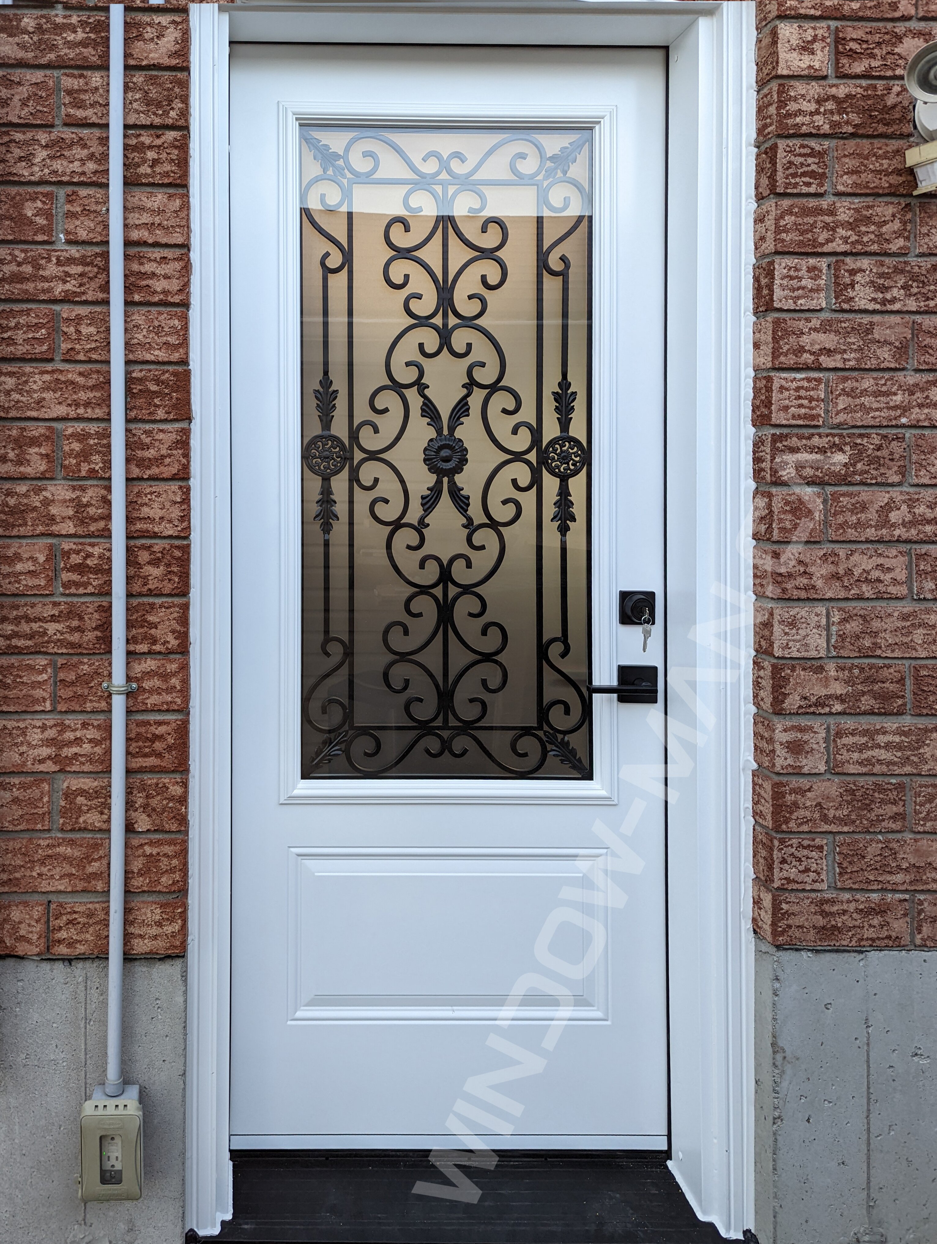 single steel door with 3/4 port stanley wrought iron glass