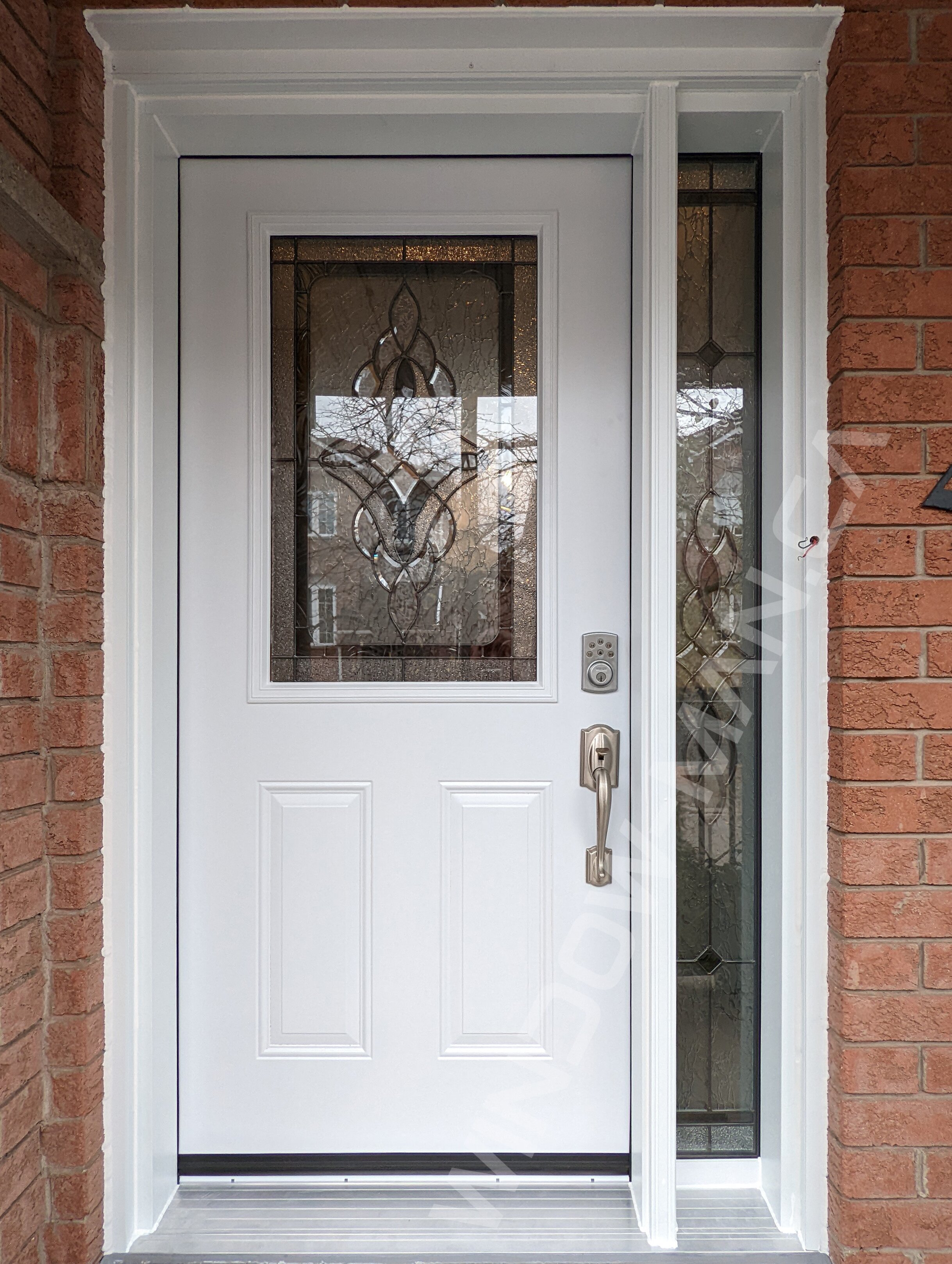 steel door with half northbay stained glass, smart lock
