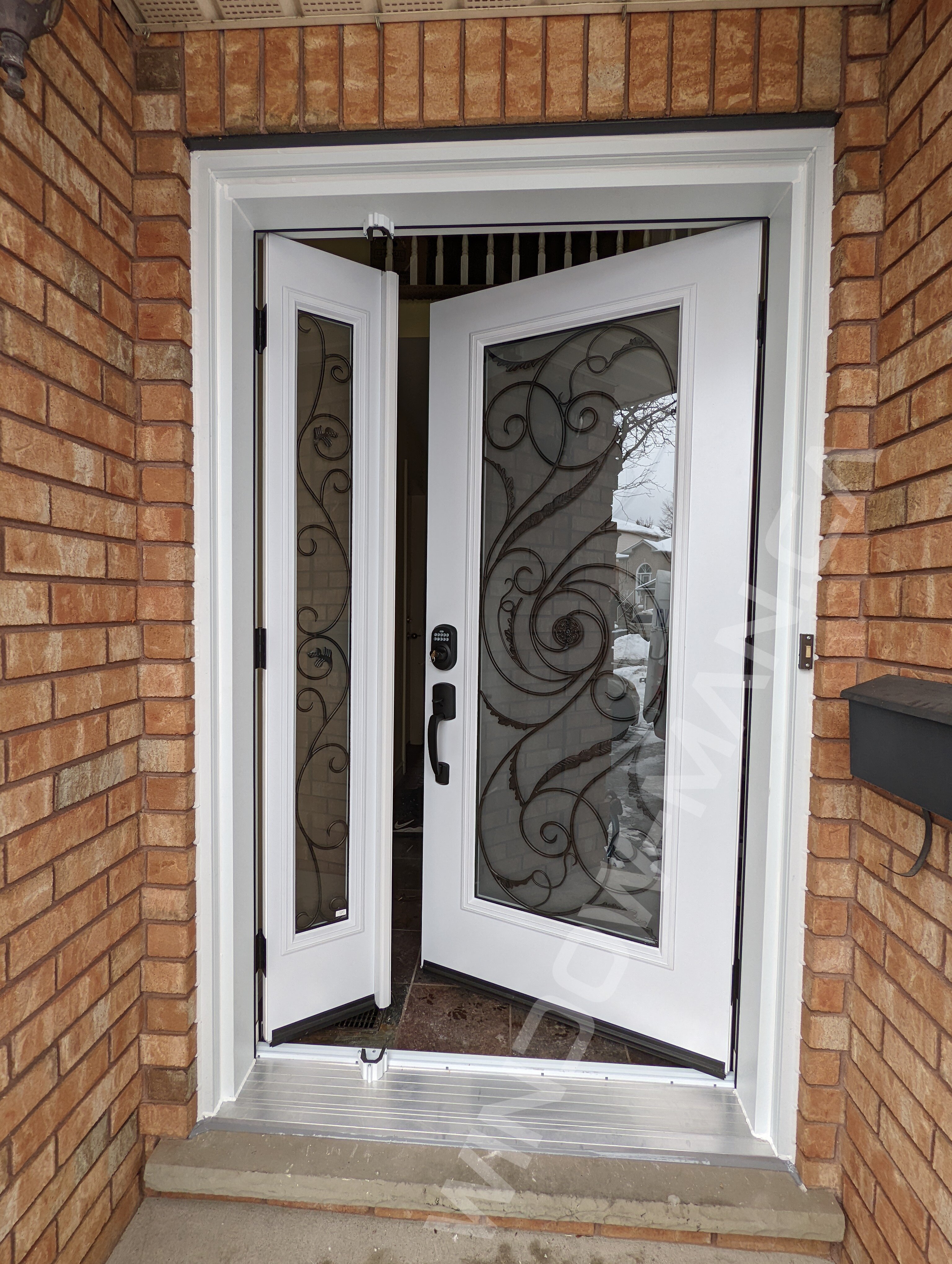 steel door with sidelight and full port union wrought iron glass, smart lock, active sidelight