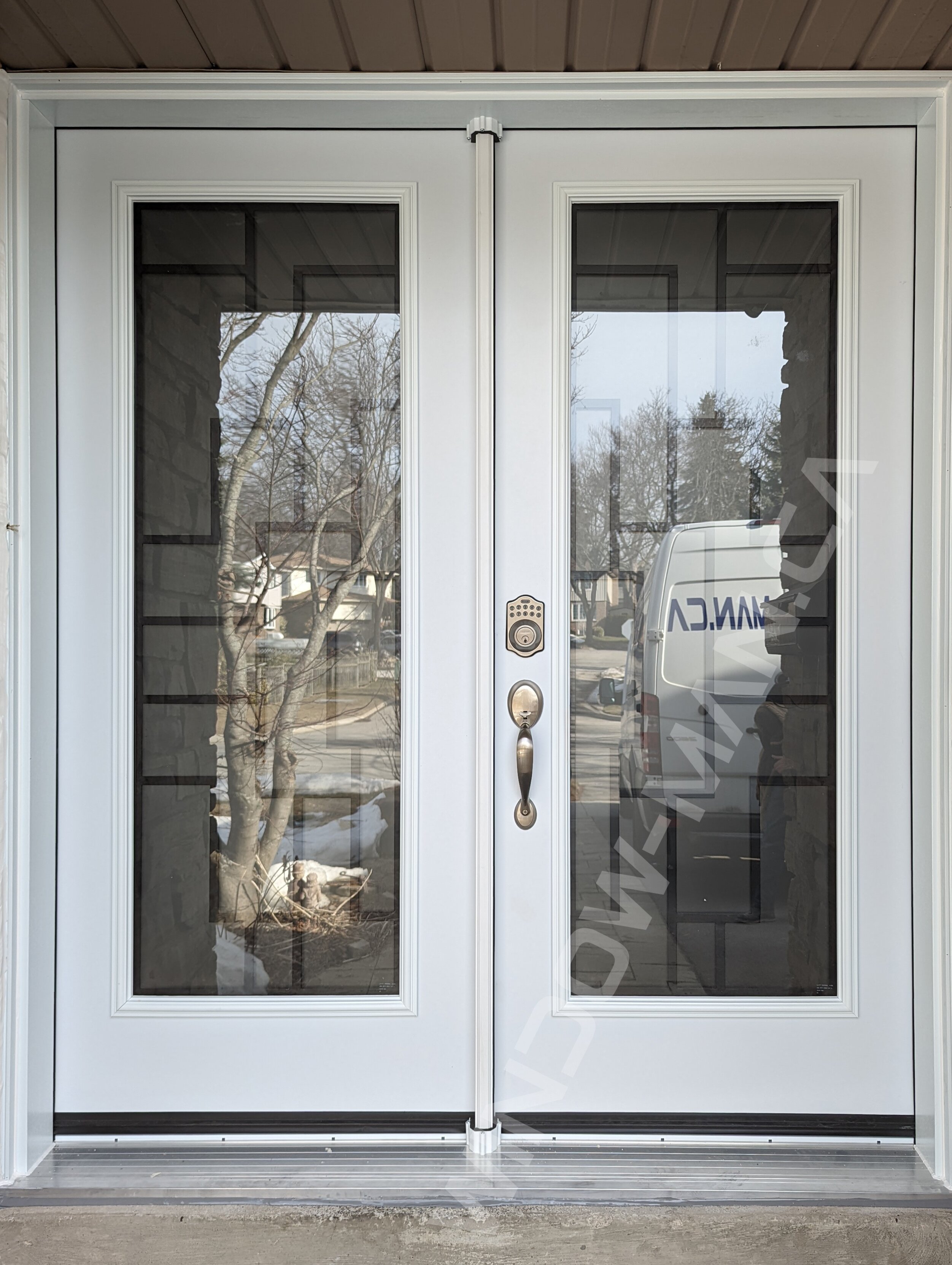 steel double door with full malibu wrought iron glass and smart lock