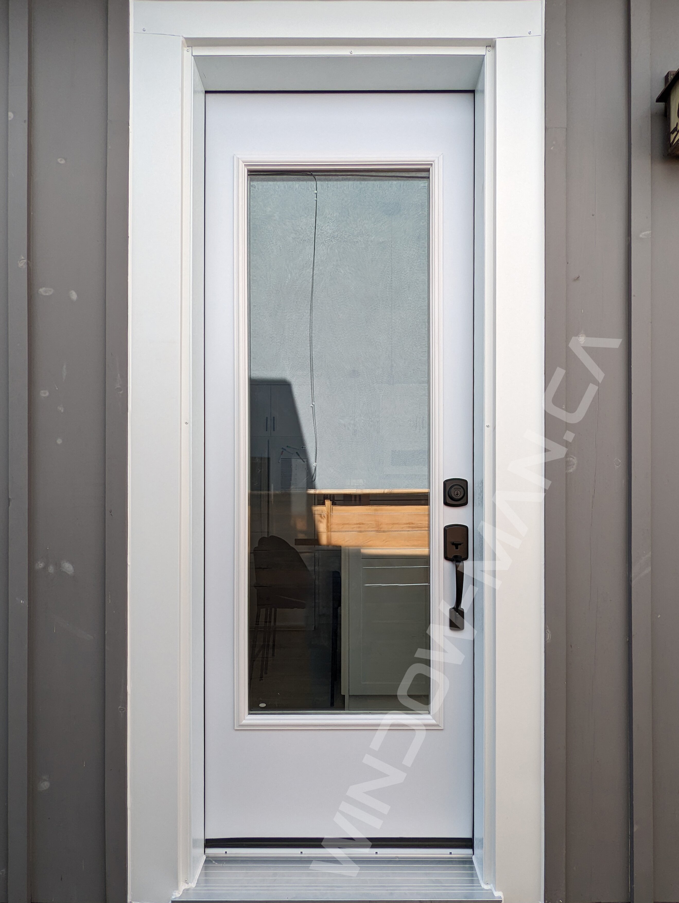 steel tall narrow door with full clear glass