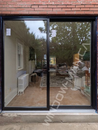 black aluminum sliding door with full clear glass, novatech urbania loft