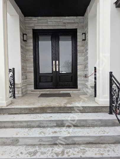 black oak grain fiberglass double door with 3/4 clear border glass, 8-foot, multipoint lock - view from the outside