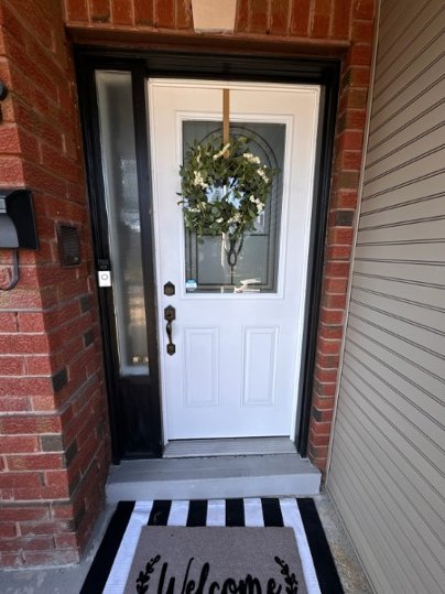 black mahogany grain fiberglass door with sidelight and acid etched glass, 2 panel, smart lock - before-after