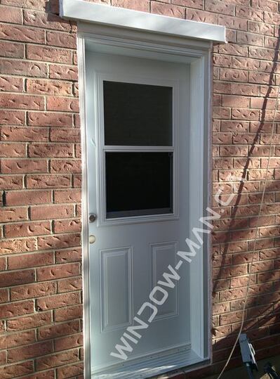 black metal exterior doors single in white half venting glass - view from the outside