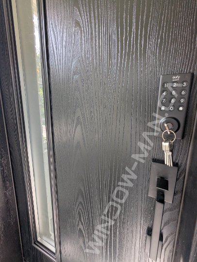 black oak grain fiberglass door with full acid glass, smart lock, novatech vertical accent - detailed close up