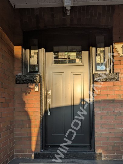 black steel craftsman door with side windows and santa fe stained glass, 2 panel - before