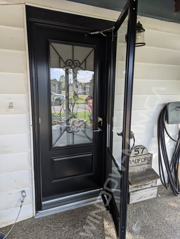 black steel door with 3/4 blackburn wrought iron glass and storm door - view from the outside