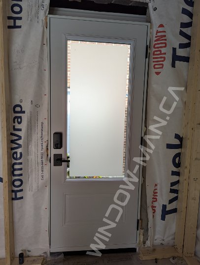 black steel door with 3/4 clear border glass, smart lock - view from the inside