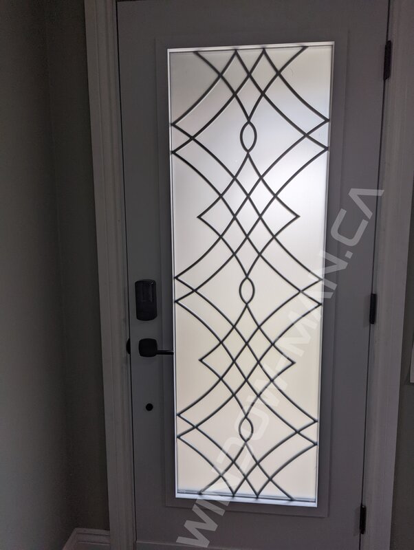 black steel door with full oak ridge wrought iron glass, smart lock - view from the inside