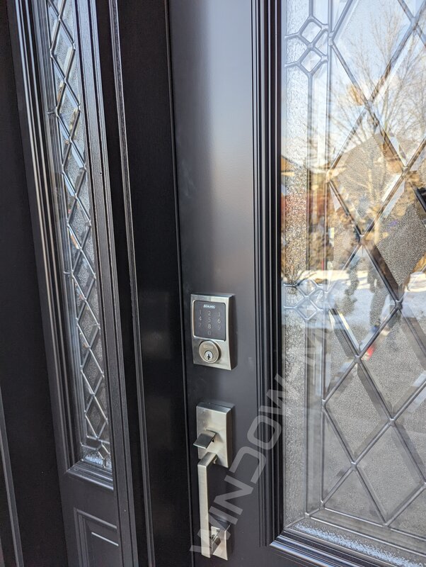 black steel door with sidelight and 3/4 cookstown stained glass, smart lock - detailed close up