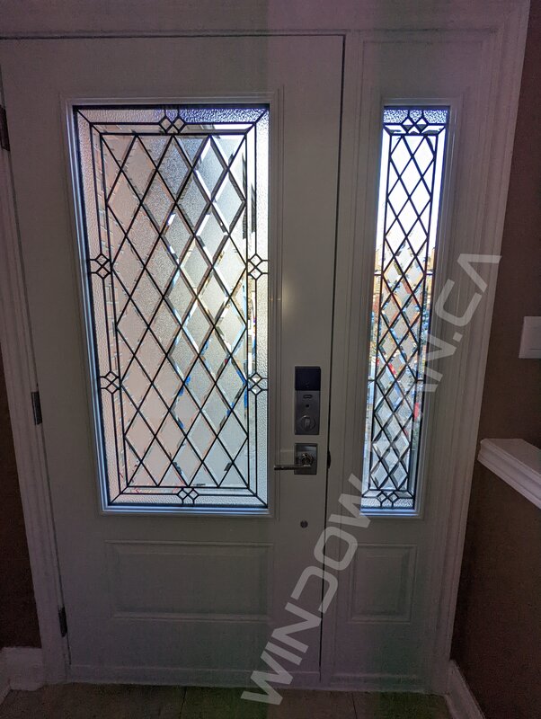 black steel door with sidelight and 3/4 cookstown stained glass, smart lock - view from the inside