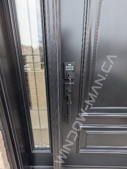 black steel door with sidelights, executive panels, smart lock - detailed close up