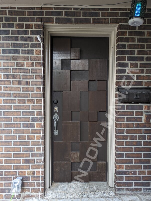 black steel garage door, 2 panel - before-after