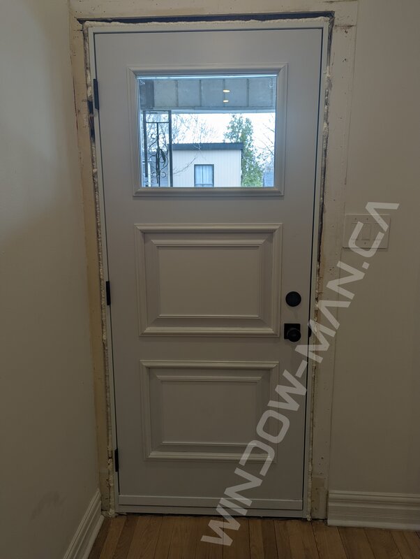 black steel door with small clear glass and executive panels, novatech sydney - view from the inside