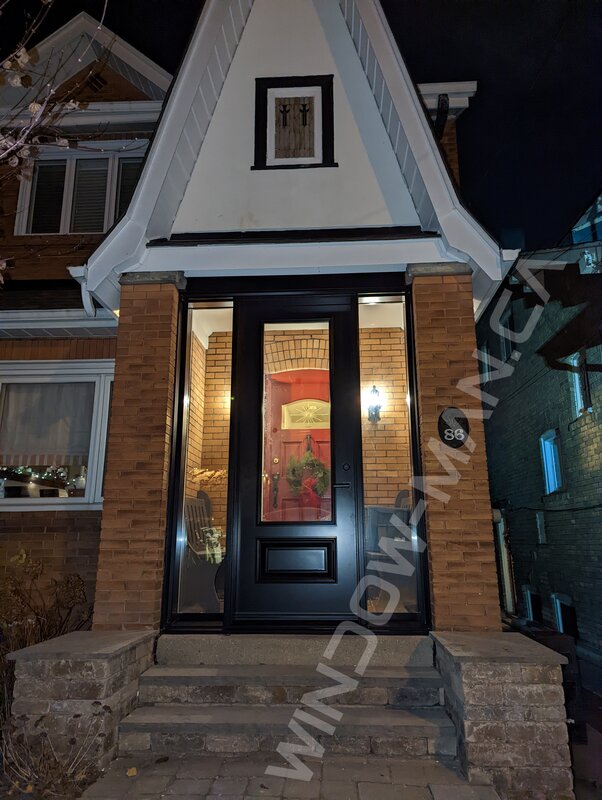 black steel tall door with sidelights and 3/4 clear glass, 8-foot - view from the outside