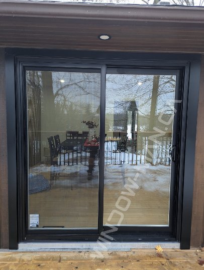 black vinyl sliding patio door with clear glass