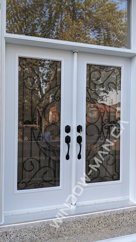 door exterior steel double in white with rochester full wrought iron glass with huge transom - view from the outside