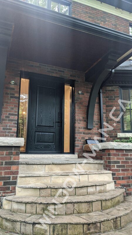 fiberglass exterior door with sidelights in black with three-point locking system oak grain - detailed close up