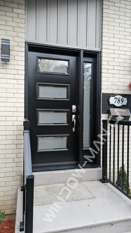 front door with side panel in black shaker frosted clear border glass - view from the outside