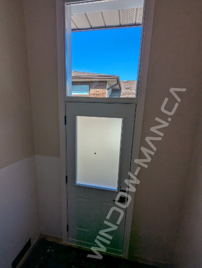 side entrance door with half acid glass and transom - view from the inside