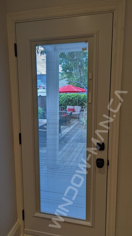 steel door with full glass and mini blinds - view from the inside