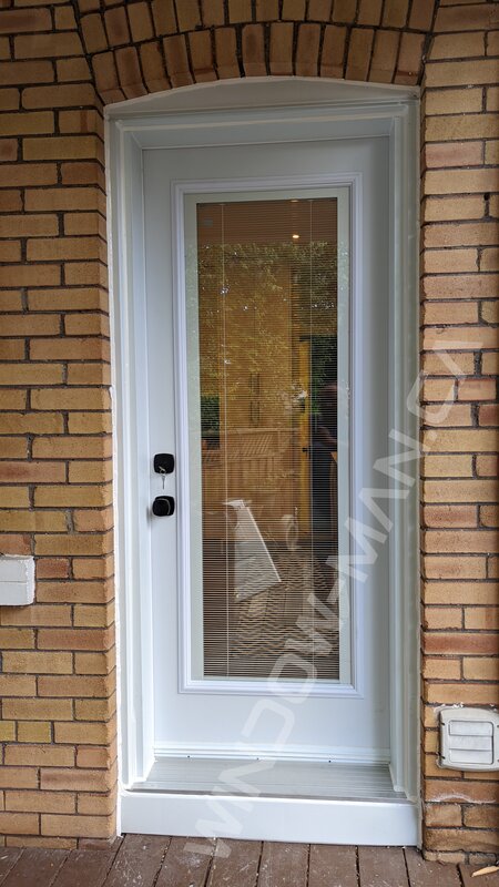 steel door with full glass and mini blinds - view from the outside