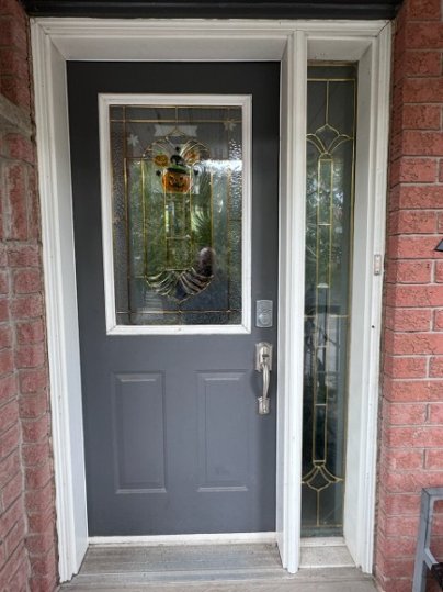 steel door with half northbay stained glass, smart lock - before-after
