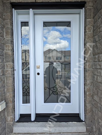steel door with sidelight and full blackburn wrought iron glass - view from the outside
