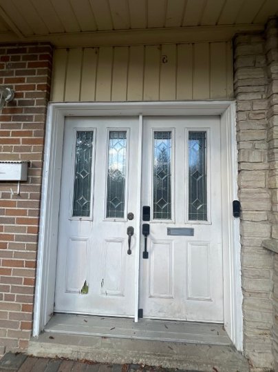 steel double door with 3/4 ashbourne stained glass, smart lock - before-after