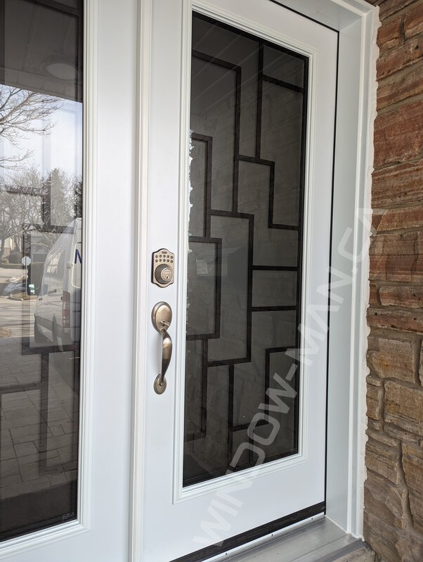 steel double door with full malibu wrought iron glass and smart lock - detailed close up