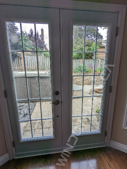 steel french door with full glass and 15 lite 3x5 grid - view from the inside