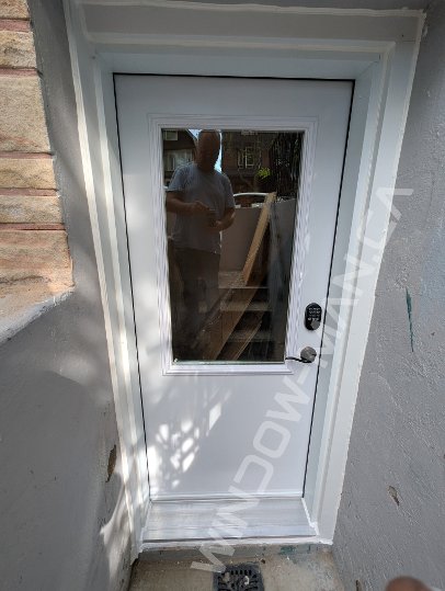 steel short basement door with half clear glass, smart lock - view from the outside