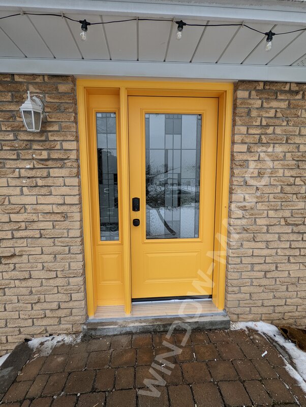 yellow steel door with sidelight and 3/4 santa fe stained glass, smart lock - view from the outside