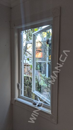 24 x 36 white vinyl casement bedroom window - outside view