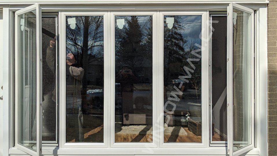 living room with big windows – 10 foot casement window for open living spaces
